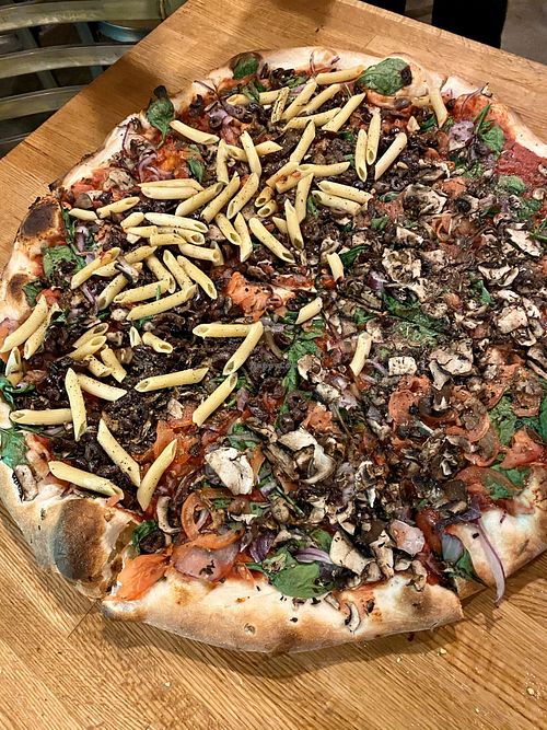 23” pie, half each of the animal lover and penne tom  at Boss Lady Pizza in Boulder