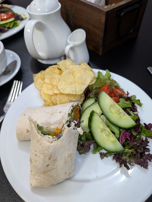 Sweet potato falafel wrap and tea with oat milk at Buttercups in Cromer