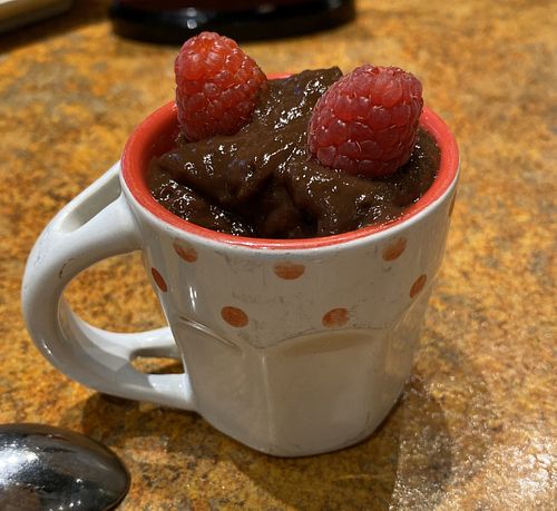 In-store made chocolate pudding in a tiny cup. Love it   at Loma House Vegetarian Express in Edmonton