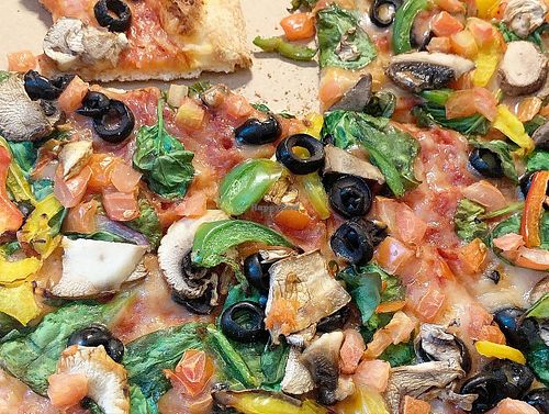 Vegan cheese on supreme pizza at Domino's Pizza - Pâquis in Geneva