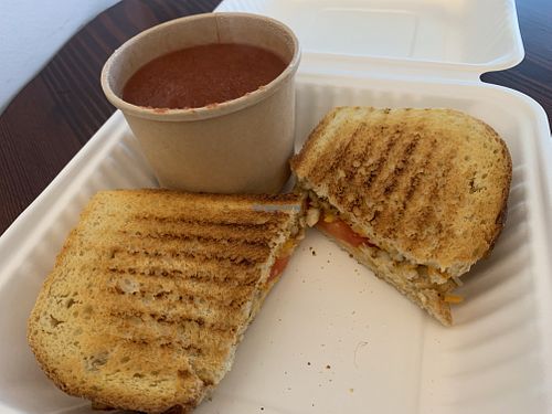 Grilled cashew cheese with tomato basil soup! Where are my ice skates…?  at Feel Good Smoothie Bar and Cafe in Oneonta