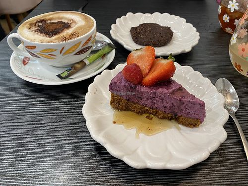 Cappuccino, raw vegan chocolate cookie, speculoos & berries cake  at Healthy Lounge in Antibes