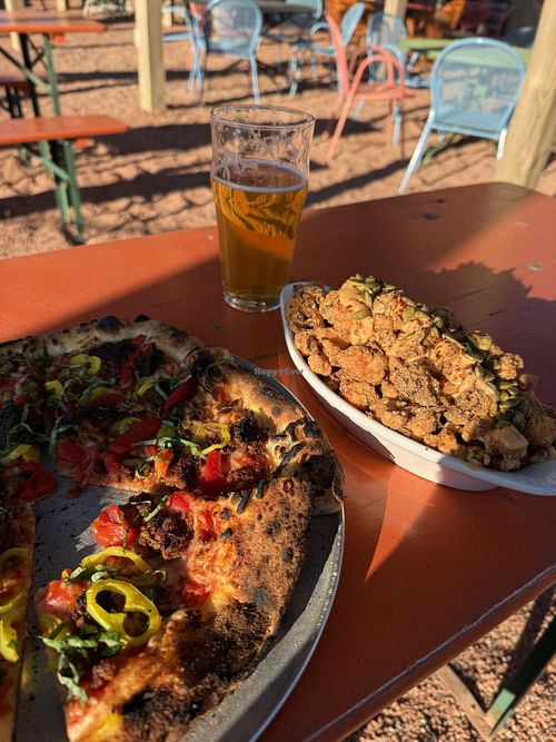 Vegan pizza and vegan cauliflower (so good). Great patio space    at Hydraulic Hearth in Buffalo