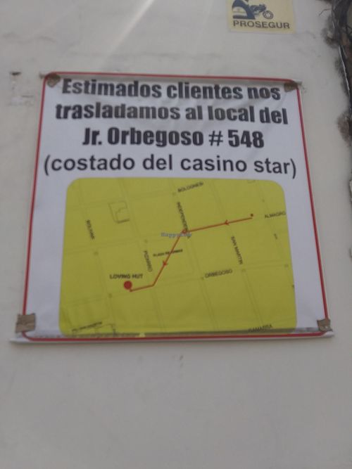 Sign showing new location at Loving Hut - Diego de Almagro in Trujillo