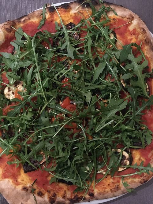 Pizza delicata, with grilled courgette, rocket salad and cherry tomatoes  at Chocabeck in Cremona