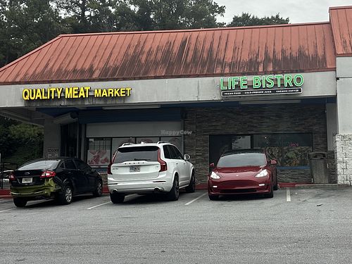 Competing neighbors 👎  at Life Bistro in Atlanta