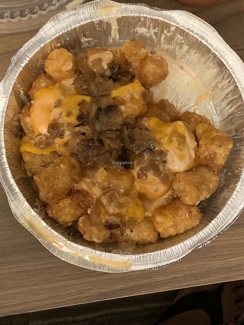 California tater tots with thousand island dressing, vegan cheese, and grilled onions at Cheesewalla in Redlands