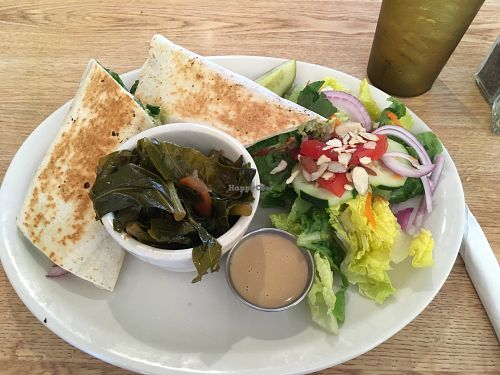 Hummus wrap plate with salad and collards  at Sluggo's North Vegetarian Cafe in Chattanooga