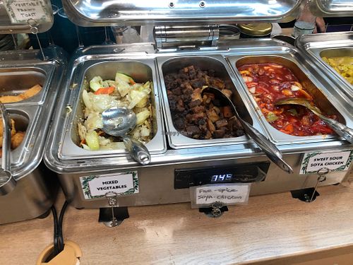 Buffet selection inc 5 spice chicken and sweet and sour chicken. at Su Vegan Buffet in West London