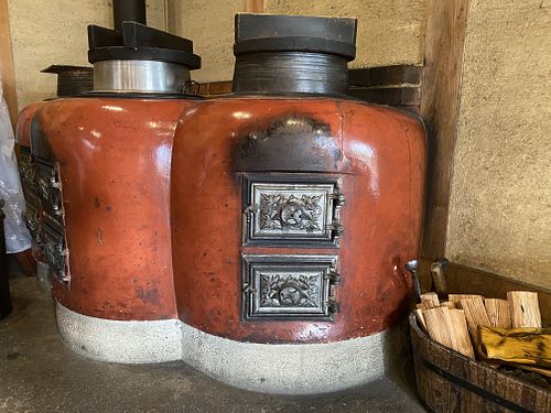 Kamado that burns wood is used to cook the rice at Genmai-an in Nara