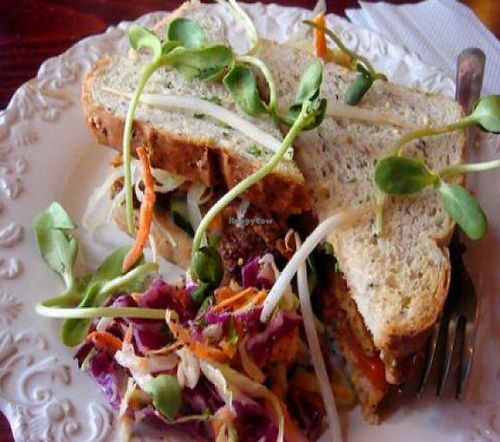 Tempeh Reuben: Fresh Marinated Tempeh Served on Health Bread with a Reuben Sauce, Tomatoes, Lettuce, Sprouts, and Cucumbers by kris from veganscraps at Chef Brooke's Natural Cafe in Fort Myers