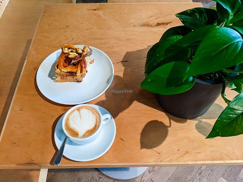 Vegan pastry and cappuccino with oat milk at Zeit für Brot at Zeit Für Brot - Berlin Mitte 1 in Berlin