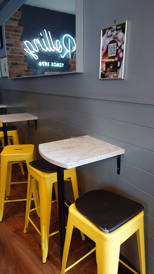 Some tables inside at The Rolling Donut - O'Connell St Kiosk in Dublin
