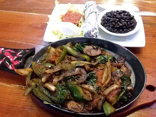 Veggie Fajitas with 4 rolled tortillas, veggies/mushrooms, black beans, salsa and lettuce (ask for no sour cream) at Lizzy's in Savannah