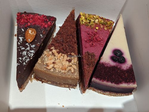 Take away box with 4 raw vegan cakes at Patisserie Valerie in Edinburgh