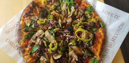 Build your own pizza vegan cheese at Rise Pies in Warren