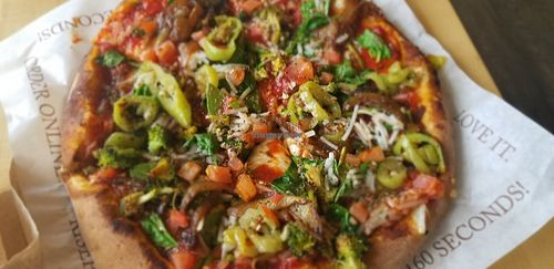 Build your own pizza vegan cheese at Rise Pies in Warren