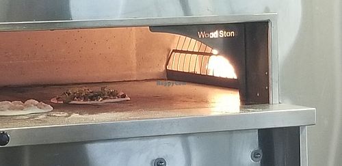 Pizza in the oven at Rise Pies in Warren