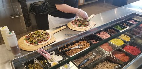 Pizzas being built at Rise Pies in Warren