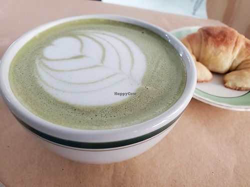 Matcha latte and sweet medium moon bread at Mola in Buenos Aires