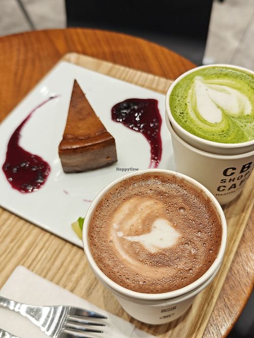 Cheesecake and matcha latte + hot cocoa at HealthyTOKYO CBD Shop & Cafe - Harajuku in Tokyo