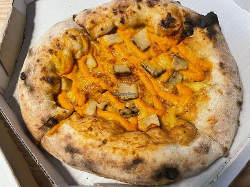 Three cheeses flavour pizza at Planet Vegan in Sao Paulo