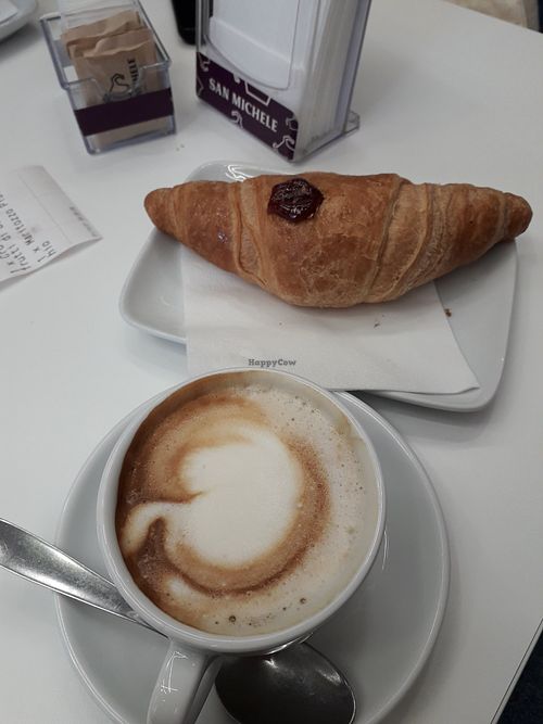 Soy cappuccino and vegan croissant with jam at San Michele Sud Experience in Padua