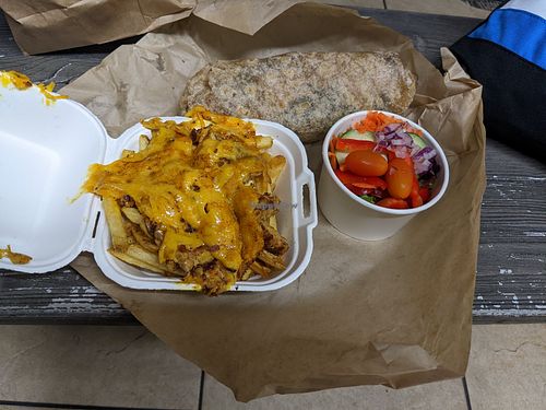Cheese fries, side salad & veggie wrap at Evolution Fast Food in San Diego