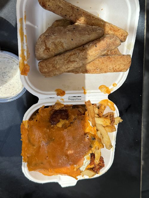 Chicken tenders and bacon cheese friess  at Evolution Fast Food in San Diego