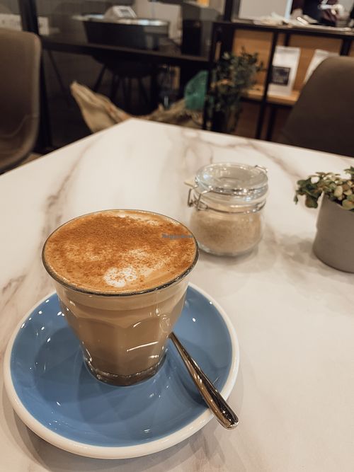 Almond milk latte with cinnamon ☕️ at The Studio Beans in Carnegie