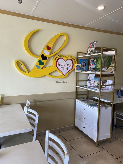 Literature Corner • Supreme Master Ching Hai  at Loving Hut in Orange