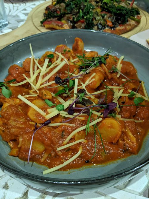 Sweet potato gnocchi with tomato and jackfruit ragu and vegan cheese at Bounty Beets - Le Meridien Mina Seyahi in Dubai