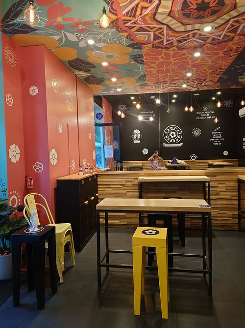 Inside seating at Flower Burger in Rome