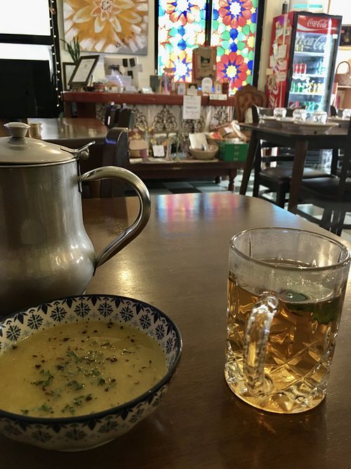 Free lentil soup and self-serve green tea with fresh mint leaves  at Asalam Restaurant in Jeju
