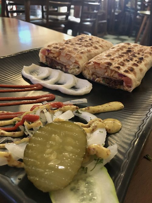 Falafel wrap with toum (garlic sauce - vegan!), mustard and ketchup on the side  at Asalam Restaurant in Jeju