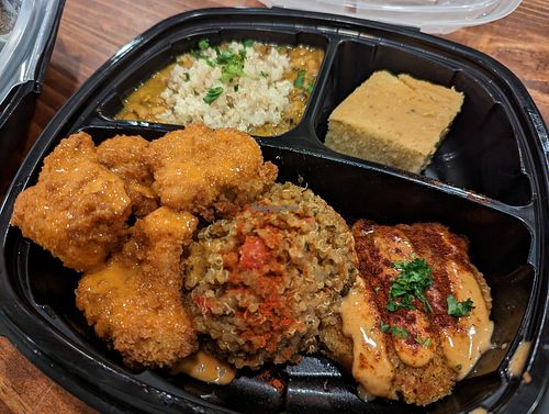 Cauliflower wings, crab cakes, cornbread, black-eyed peas and quinoa jambalaya at I-tal Garden in New Orleans