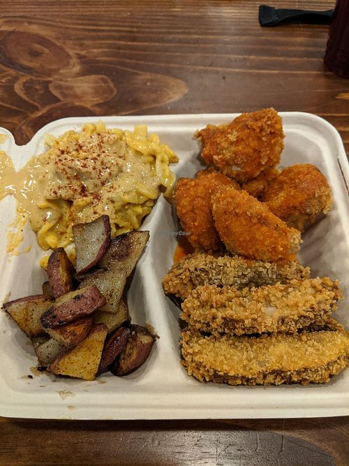 Mac n cheese, roasted potatoes, kick'n strips and buffalo cauliflower at I-tal Garden in New Orleans
