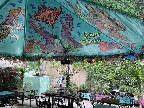 Outside  at Savage Sicko in Astoria