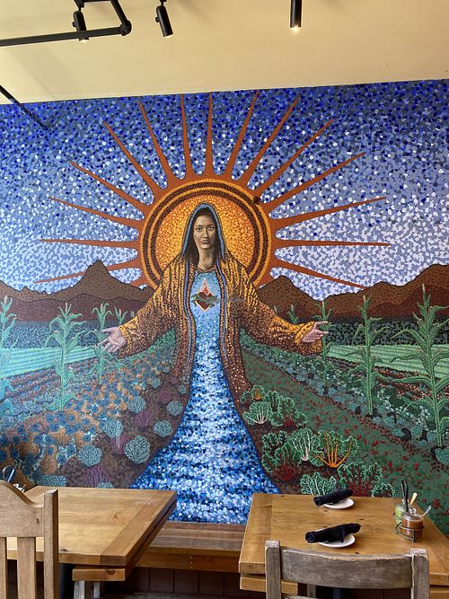 Gracias Madre Mural in patio area  at Gracias Madre in San Francisco