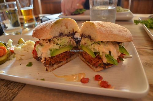 Tempeh Chorizo burger with pickles (llunch menu) - spicy !! at Gracias Madre in San Francisco
