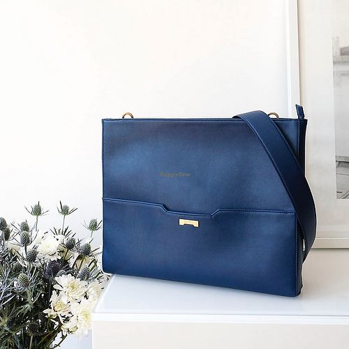 The Laptop Bag in Dark Blue at Jenah St Showroom in Berlin