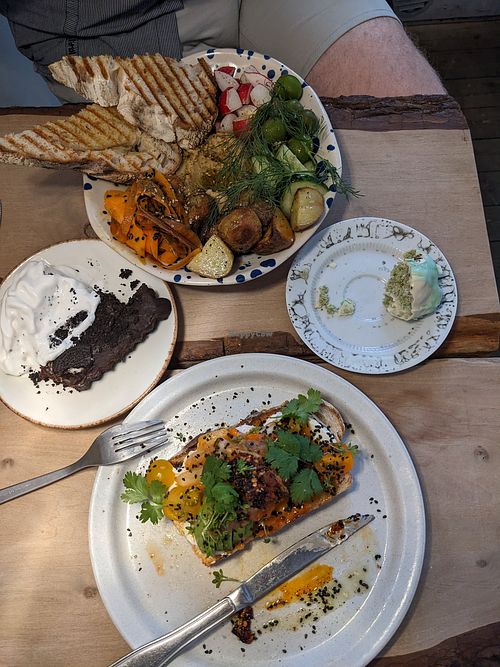 Hummus bowl, Oreo cake, kimchi avo toast, matcha ball at Farm2Table - Davidshall in Malmo
