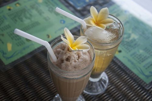 Cold drinks, beautiful presentation! at Buddha Cafe in Samosir