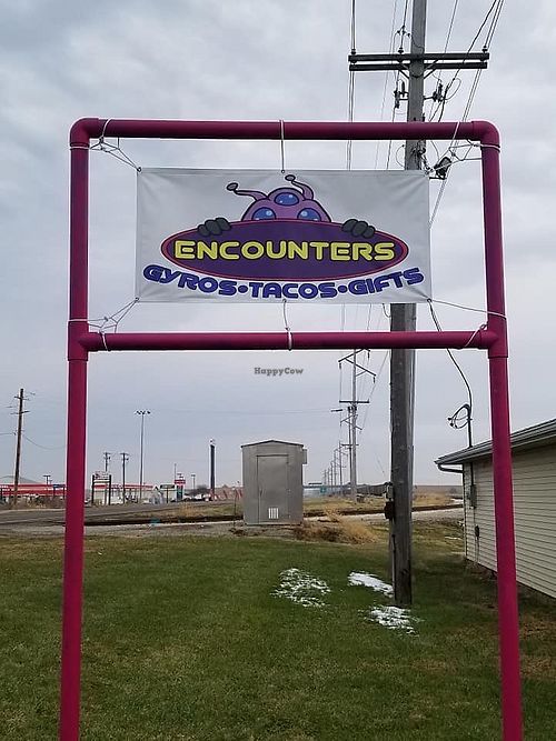 Sign out front  at Encounters in Divernon