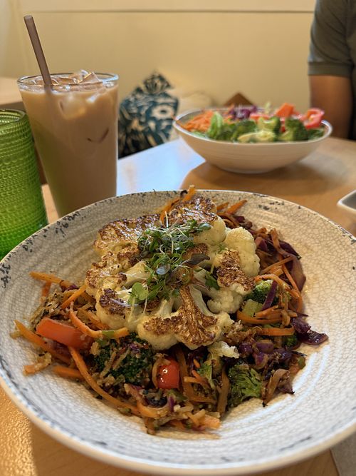 Stir fry with cauliflower steak and oat milk chai  at Good Kitchen and Market in Marietta