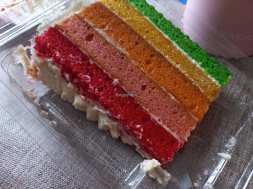 Rainbow cake slice at Coughlans Bakery - West Wickham in West Wickham