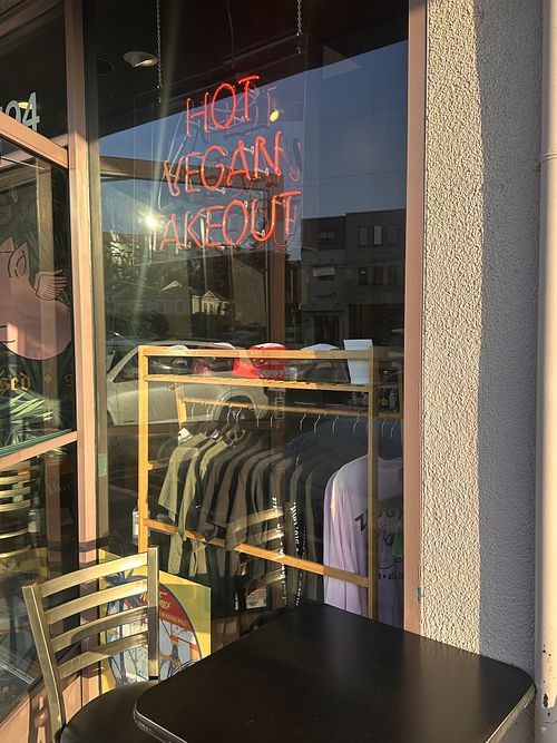 Two small tables out front   at Ziggy's in San Luis Obispo