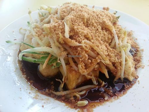 Vegetarian Taohu Goreng. Generous serving of fried bean curd, with toppings of cucumber, bean sprouts and peanut. Delicious!  at Divine Vegetarian Family 添欣素食園 in Northeast Singapore