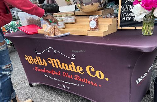 assortment of vegan butter spreads, nuts and granola at The Original Bardstown Road Farmers' Market in Louisville