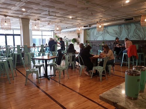 Lots of seating and people eating ham at The Green Room in Portsmouth